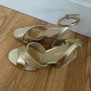 Size 6.5 Aldo gold heels